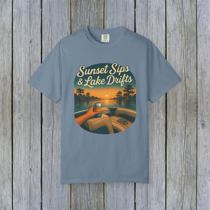 Lake Drifts T-Shirt in soft blue featuring a sunset graphic, perfect for casual wear.
