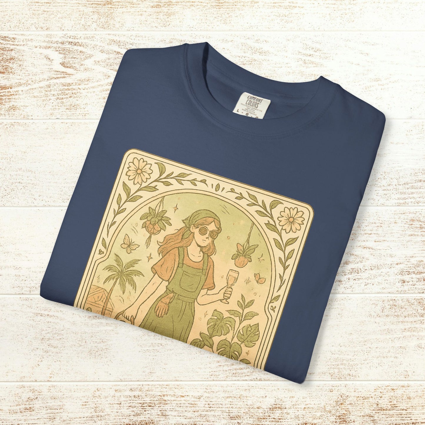 Rooted One Tarot Tee in navy color, showcasing a unique design of a girl in sunglasses among floral elements, crafted from ethically sourced cotton, offered in sizes S-4XL.