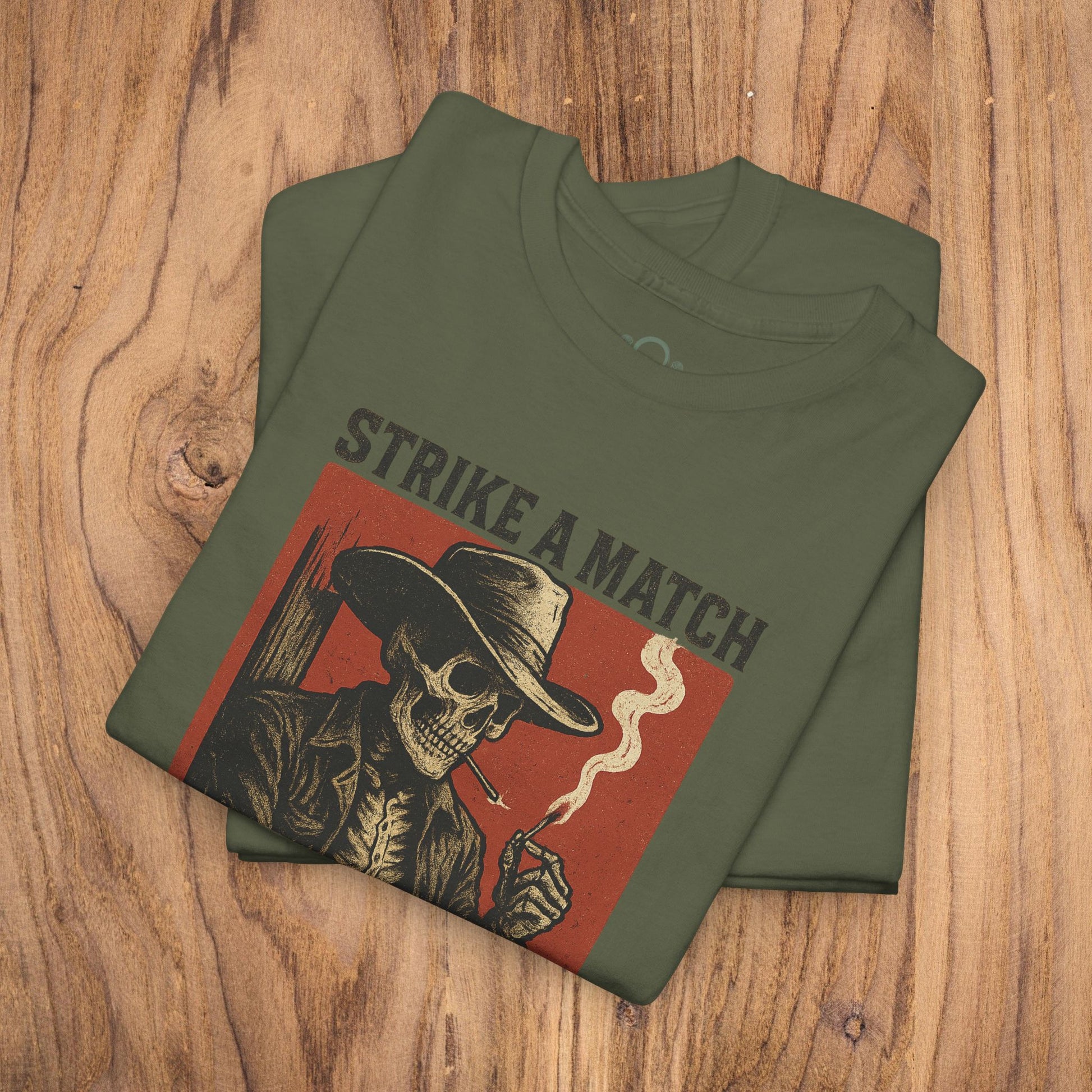 Bangtown Outlaws Retro Casual Party Shirt in olive green, showcasing a bold skull graphic with the words 'STRIKE A MATCH', ideal for fun gatherings and unique gifts.