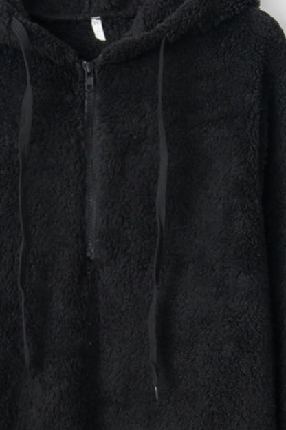 Close-up of the Cozy Full Size Teddy Hoodie with Quarter-Zip and Drawstring in black, emphasizing the high-quality fleece material and functional front zipper.
