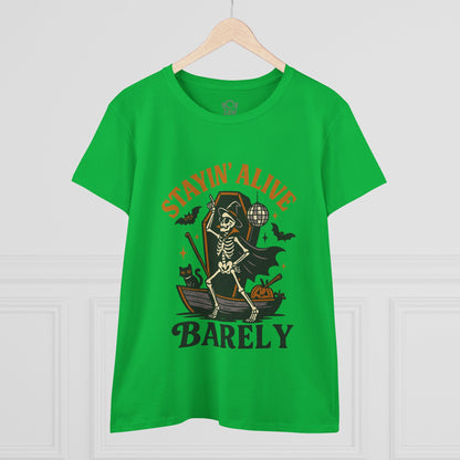 Stayin’ Alive T-Shirt featuring a playful skeleton design, perfect for Halloween celebrations. Bright green color enhances fun casual aesthetics.