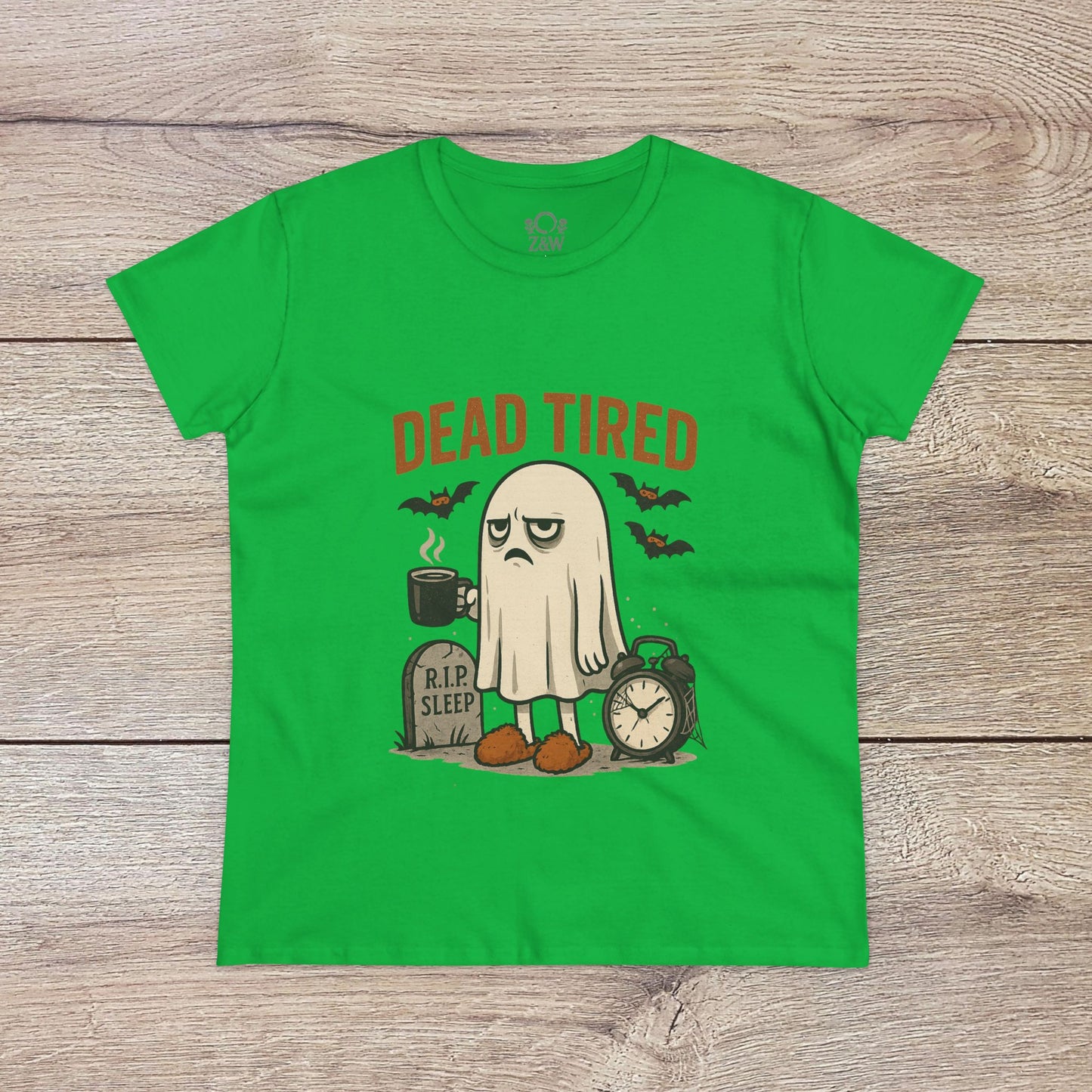 Cute Whimsical Ghost T-Shirt for Halloween in vibrant green, featuring a 'DEAD TIRED' graphic with a ghost and clock, made of cozy 100% cotton, perfect for lounging.