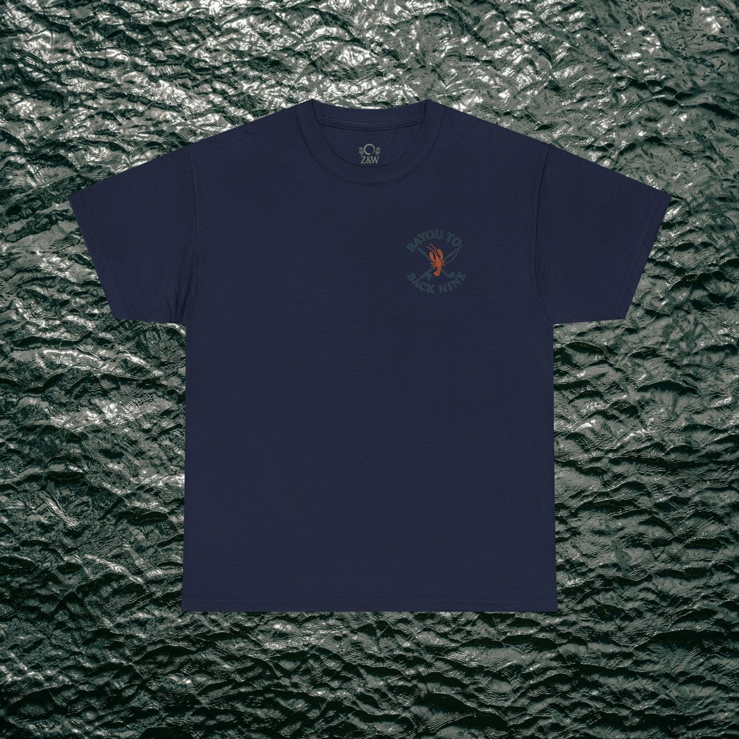 Bayou To Back Nine Softstyle Golf Tee in navy blue, providing comfort and a stylish look for casual outings and golf days.
