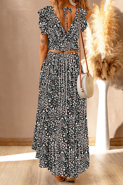 Floral Print Tie-Back Cropped Top & Maxi Skirt Set - Chic Summer Outfit with an elegant back view, emphasizing the trendy tie-back detail in a stunning floral pattern.