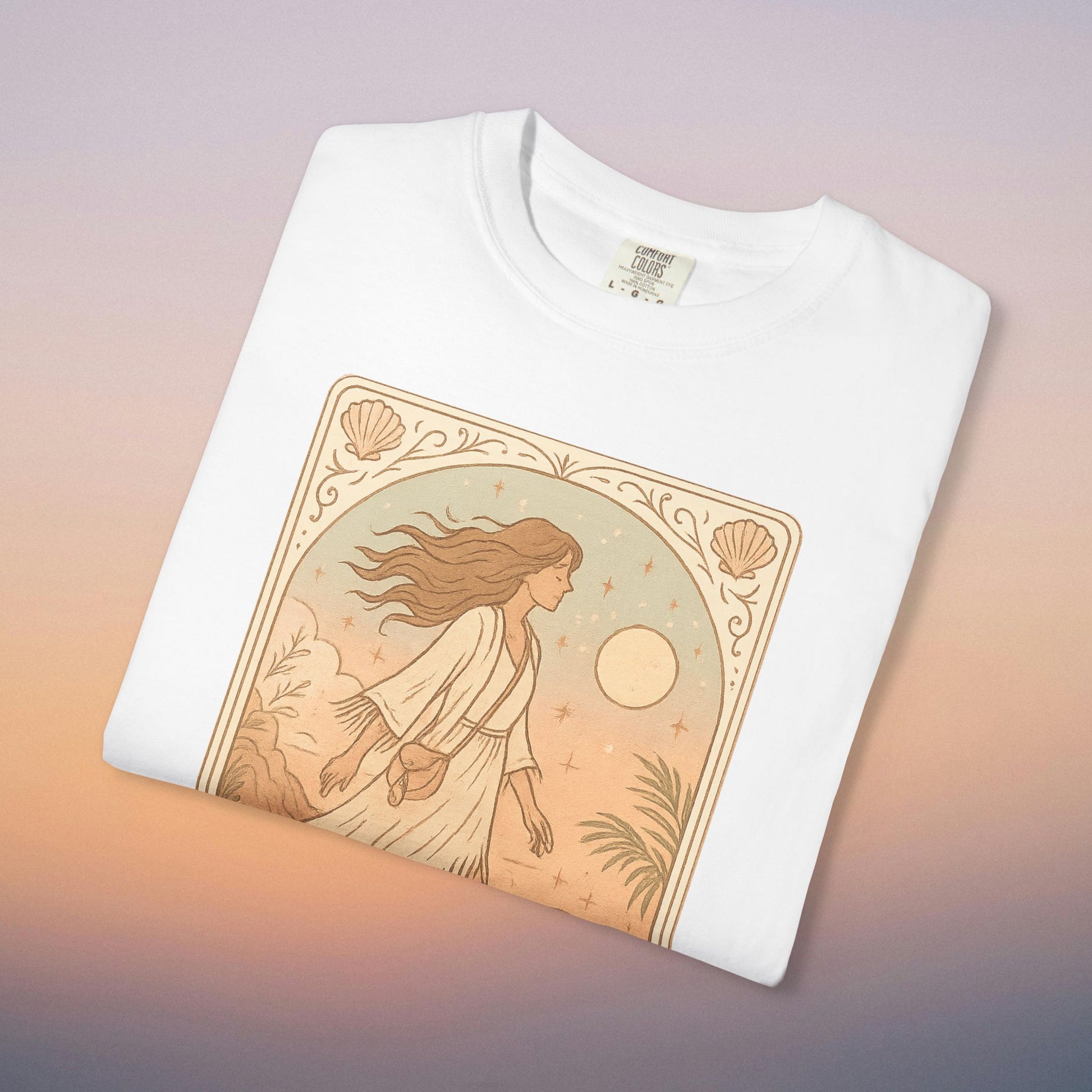 Wanderer Tarot Graphic Tee in white color, crafted from ethically made 100% cotton, showcasing an illustration of a woman amidst nature, available in sizes S to 4XL for a comfortable fit.