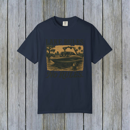 Front view of Unisex Garment-Dyed Lake Rules Tee showcasing a boat graphic and 'Lake Rules: No Rules.' Designed for comfort and outdoor adventures.