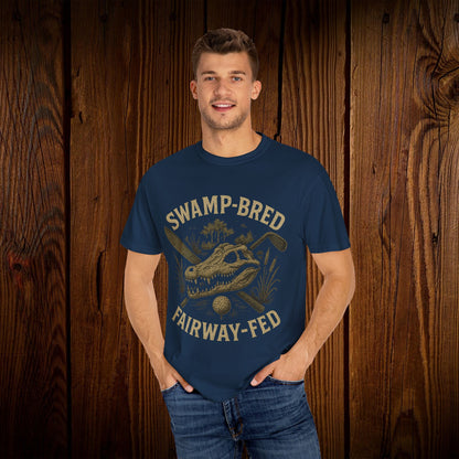 Model wearing the Unisex Swamp-Bred Fairway-Fed Tee, showcasing its comfortable fit and stylish design, perfect for outdoor activities.
