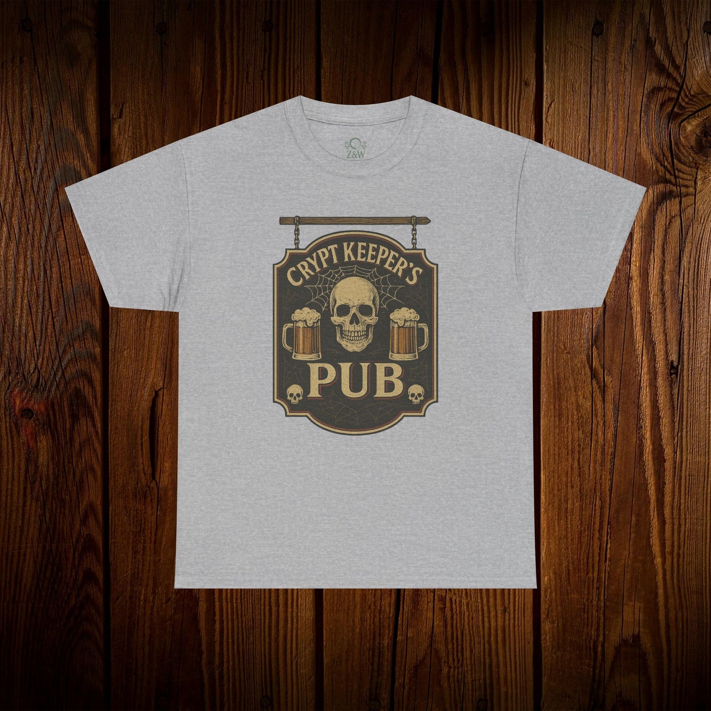 Crypt Keeper's Pub Tee in heather gray displaying a vintage skull and beer mugs, ideal for Halloween celebrations and casual outings.
