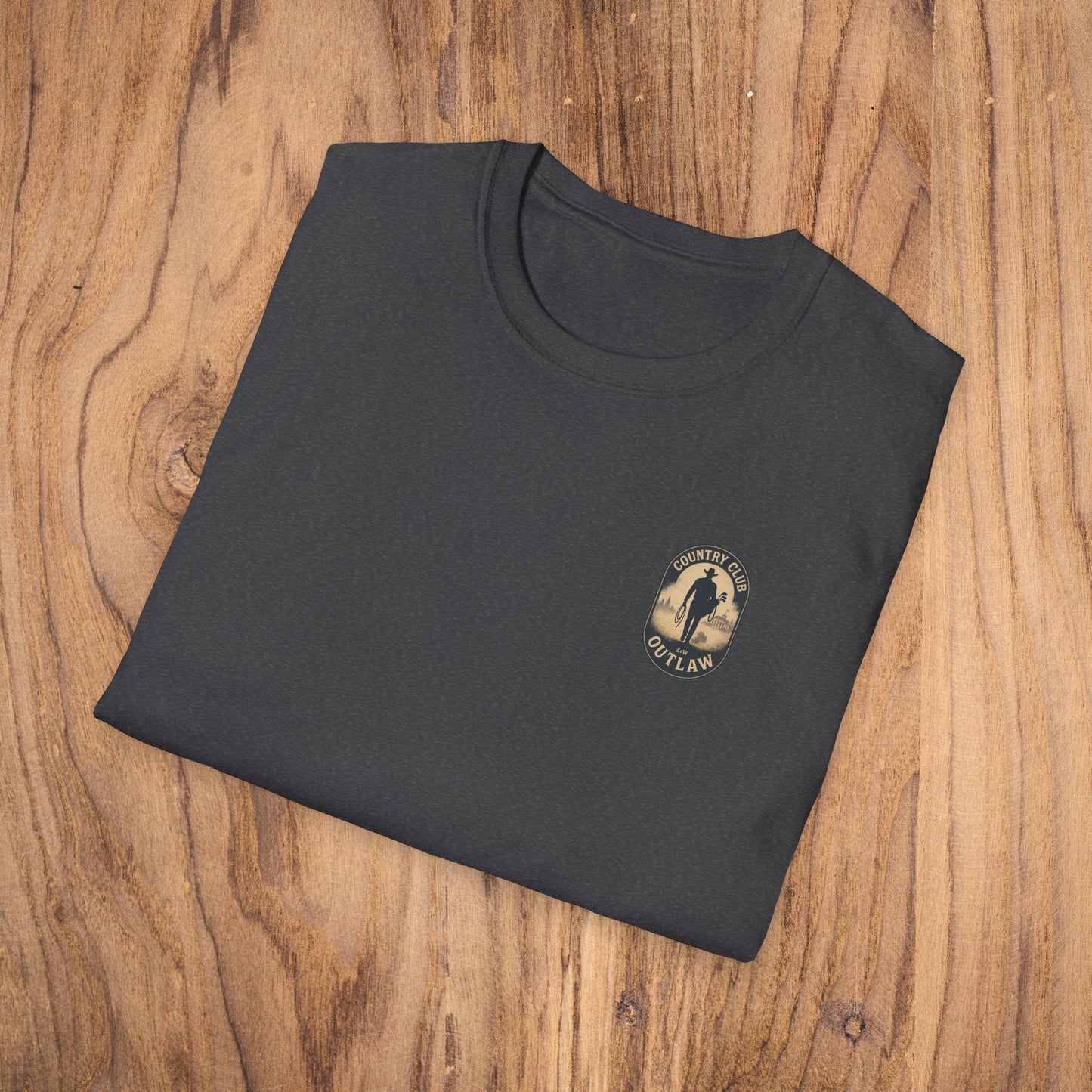 Folded Vintage Southern Gentleman Golf Shirt with the Country Club Outlaw logo prominently displayed. This cotton tee combines comfort with a stylish, classic fit.