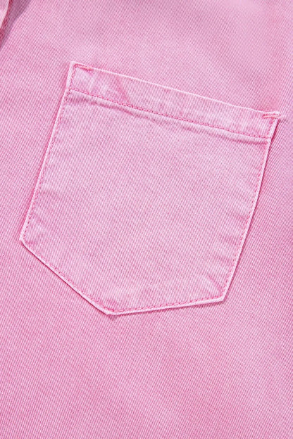 Close-up of the pocket of a Button Down Short Sleeve Denim Dress with Pockets, showcasing the practical design and denim quality.