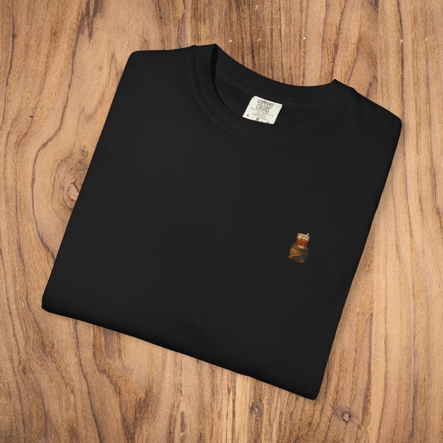 Premium Southern Made T-Shirt in black fabric, showcasing a stylish design on a wooden background.
