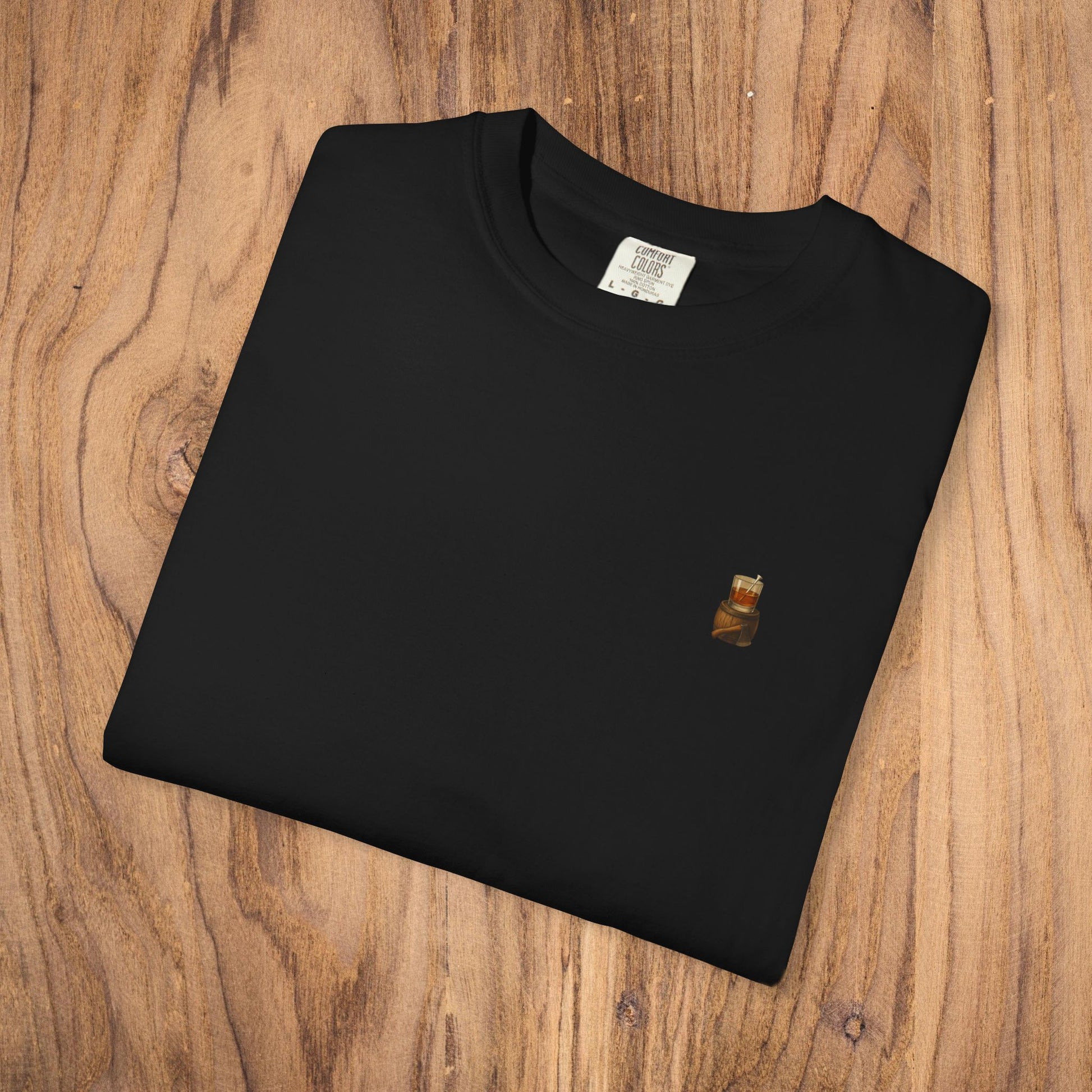 Premium Southern Made T-Shirt in black fabric, showcasing a stylish design on a wooden background.