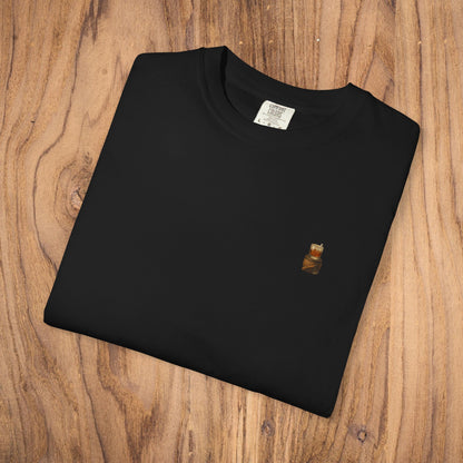 Premium Southern Made T-Shirt in black fabric, showcasing a stylish design on a wooden background.
