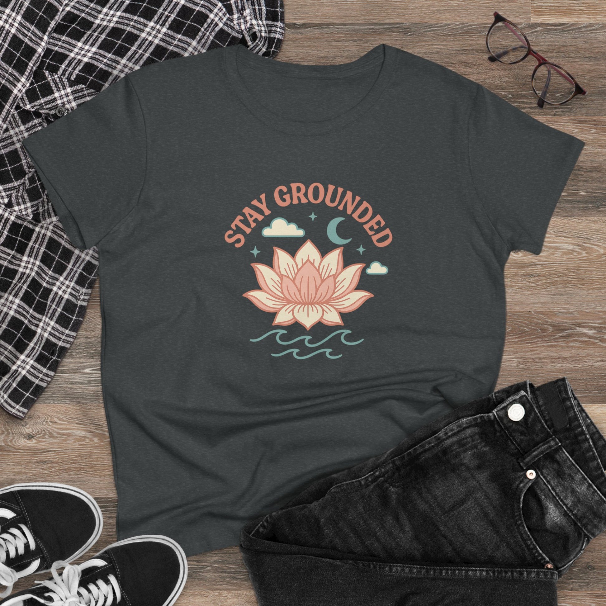 Stylish styled look of Stay Grounded Spiritual Tee with lotus graphic paired with casual wear, perfect for festivals and laid-back outings.
