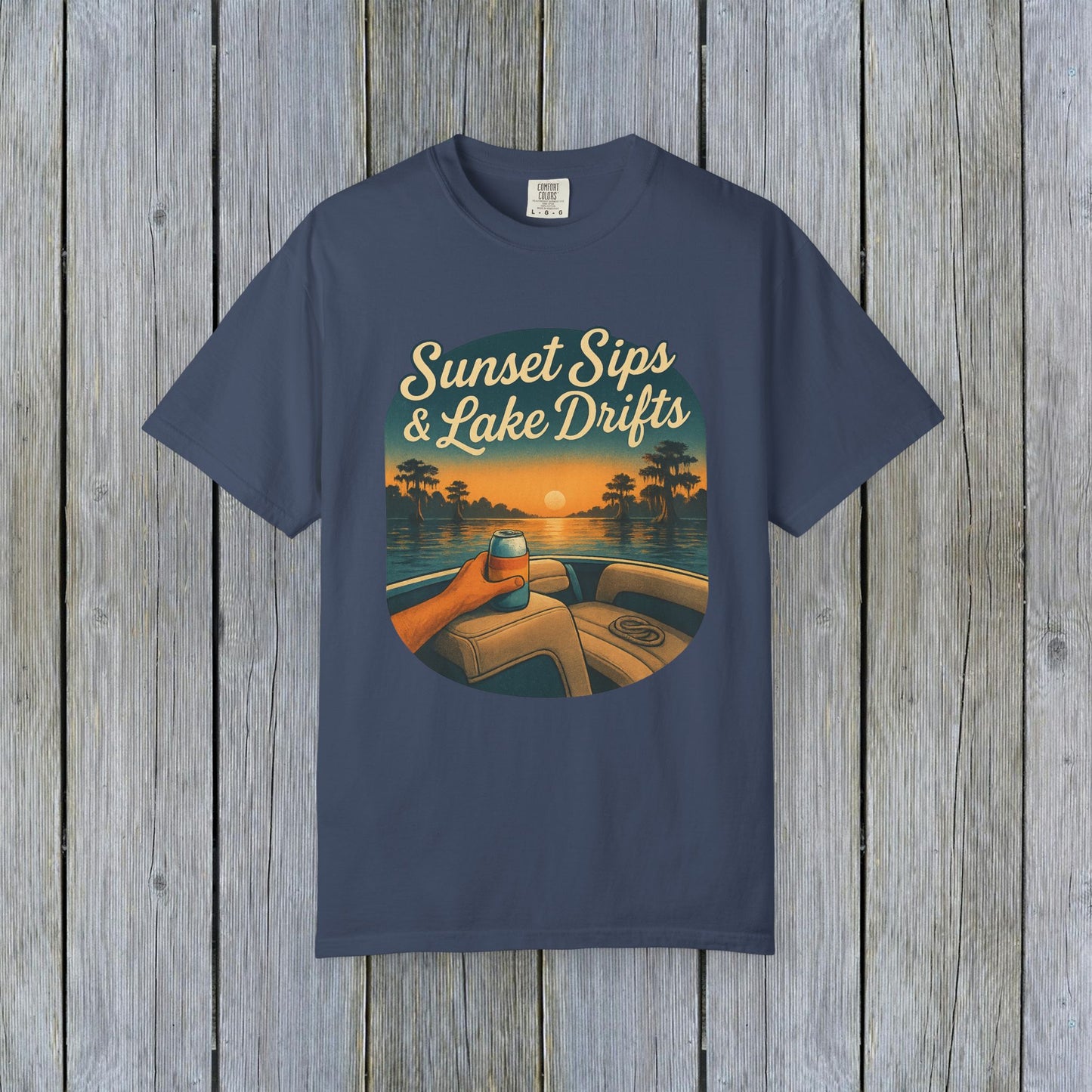 Lake Drifts T-Shirt in navy blue with a sunset sips design, great for lake days.