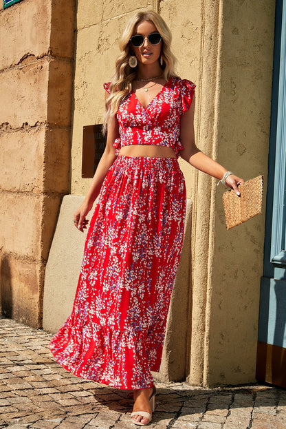Model in a Floral Print Tie-Back Cropped Top & Maxi Skirt Set walking confidently on the street, highlighting the chic summer outfit's flowy silhouette.