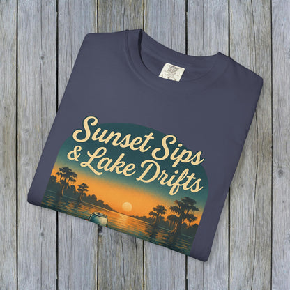 Lake Drifts T-Shirt in dark blue featuring 'Sunset Sips & Lake Drifts' graphic design, perfect for casual outdoor wear.