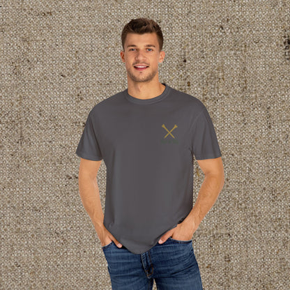 Model wearing Tee It High Let It Fly Graphic Tee in charcoal with a subtle crossed golf clubs logo; a trendy choice for golf fans.