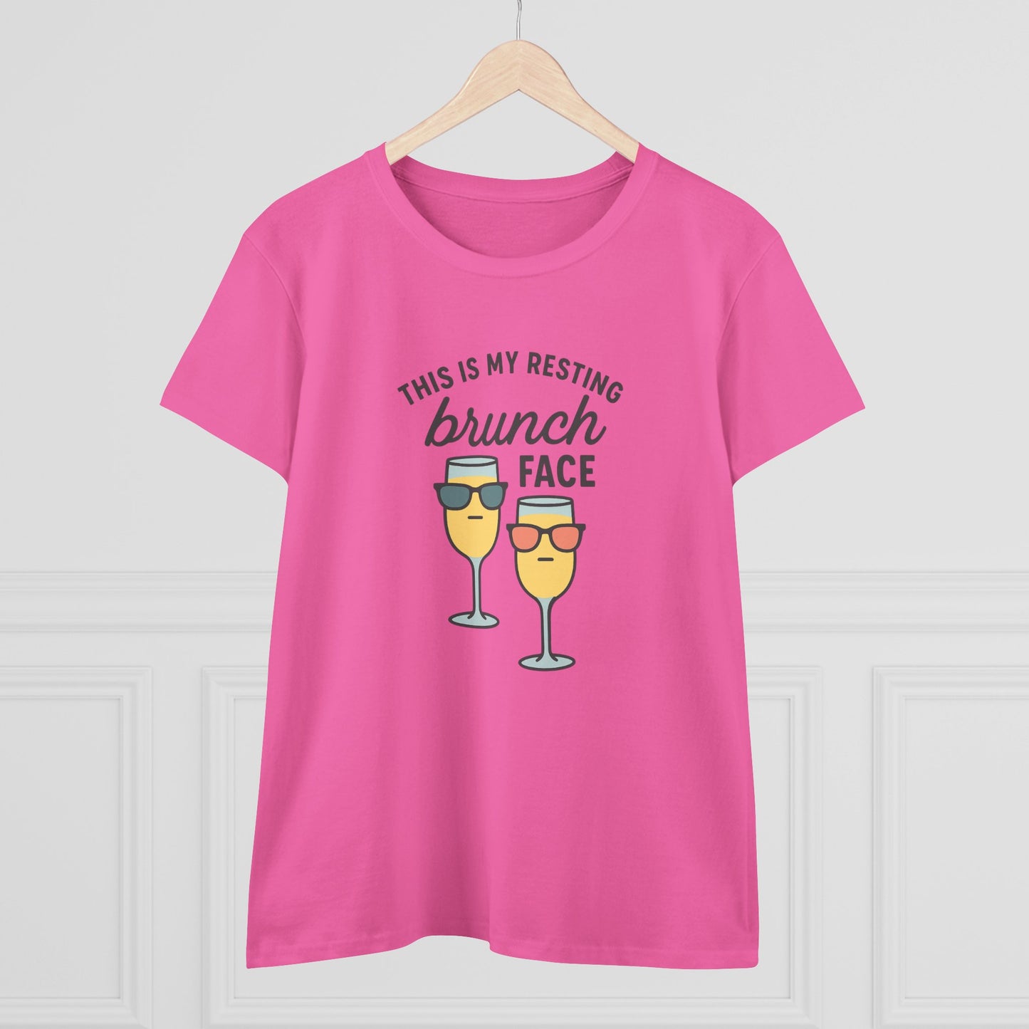 Front view of the women's premium 100% cotton brunch face tee in pink, featuring a playful brunch-themed design and relaxed style.