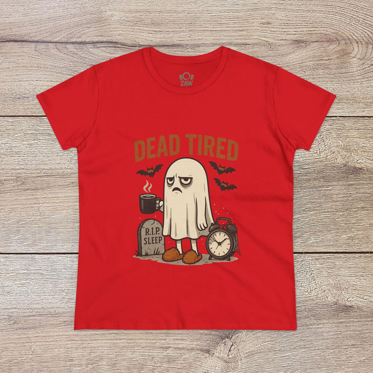 Cute Whimsical Ghost T-Shirt for Halloween in bright red, showcasing a tired ghost illustration with 'DEAD TIRED' text and grave details, ideal for cozy celebrations.