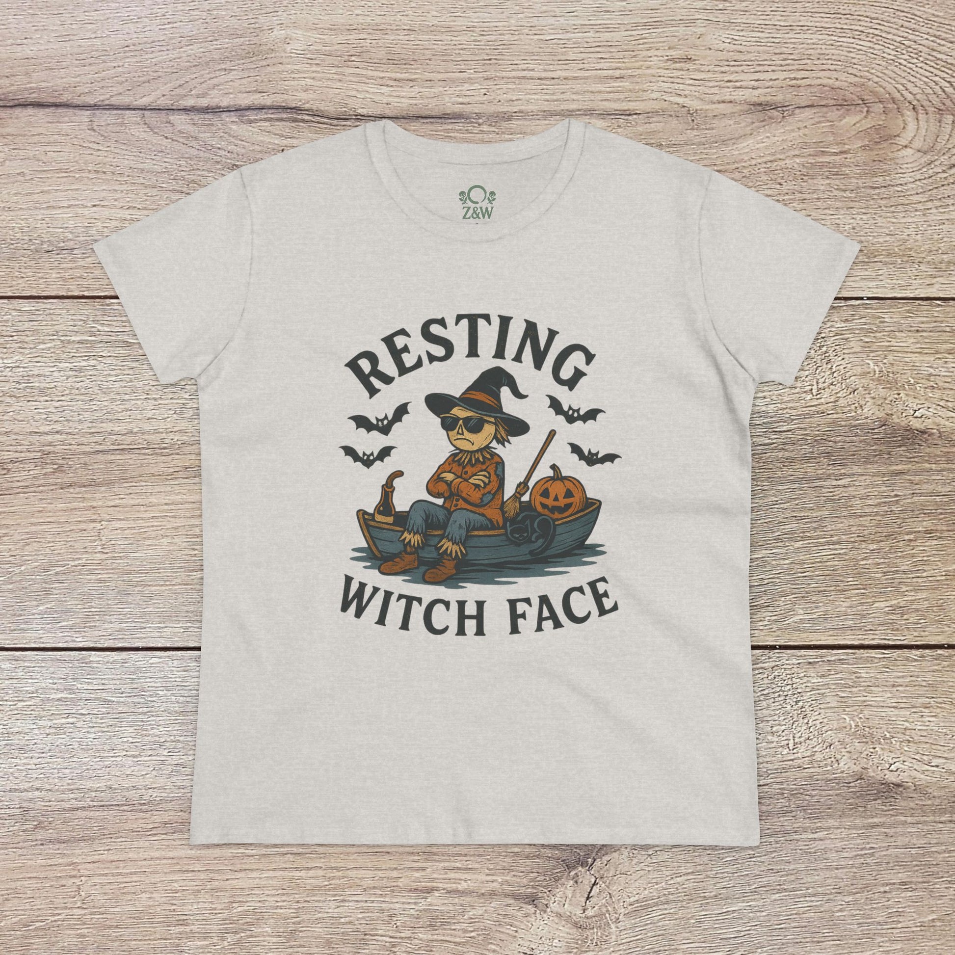 Resting Witch Face Halloween T-Shirt for Women, displaying a cute witch illustration on a heather gray shirt, an excellent choice for Halloween parties and festive gifts.