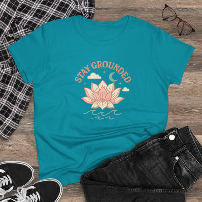 Stay Grounded Spiritual Tee featuring a beautiful lotus design on a vibrant turquoise crop top, perfect for festivals and casual outings.