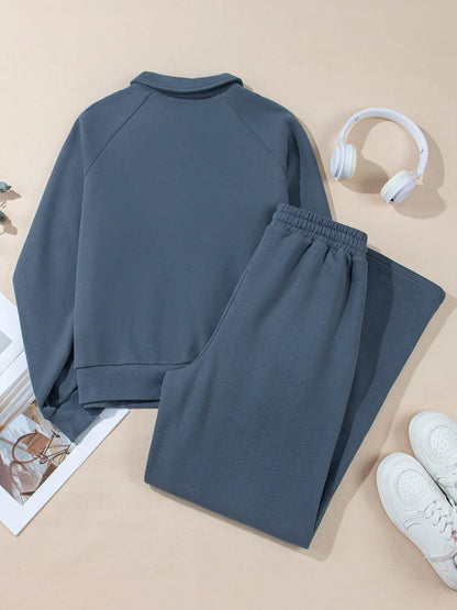 Trendsi Collared Sweatshirt & High Waist Pants Two-Piece Active Set - Soft Cotton Blend laid out on a light background, showcasing the back view of the sweatshirt and pants pairing.