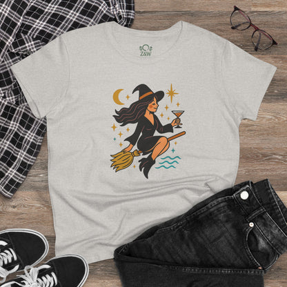 Casual view of the Witchy Night Out Tee showcasing a chic witch on a broomstick, complemented with jeans and a plaid shirt.