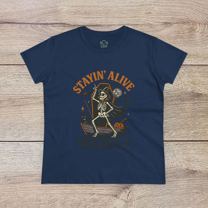 Stayin’ Alive T-Shirt in classic navy featuring a humorous skeleton illustration, great for Halloween festivities. Softstyle unisex t-shirt for any occasion.