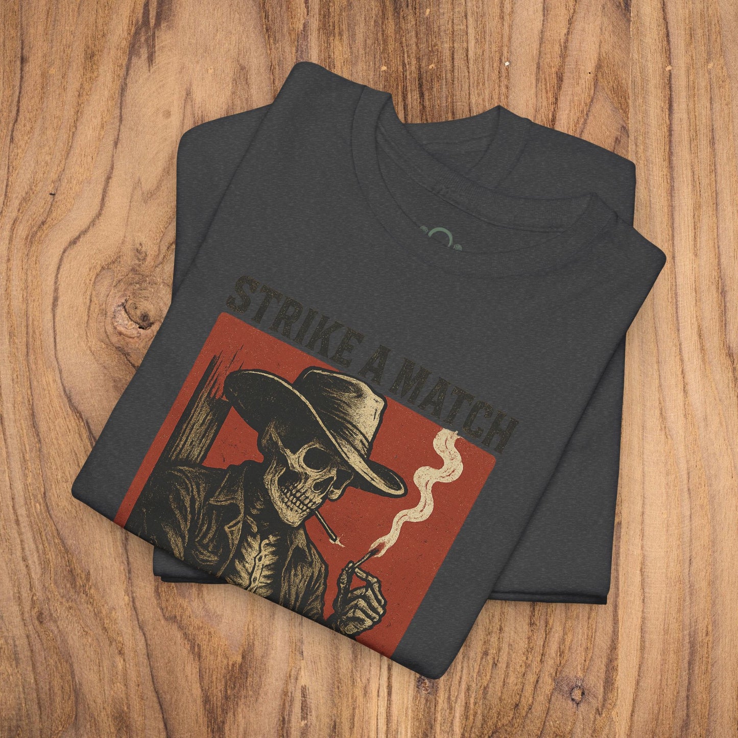 Bangtown Outlaws Retro Casual Party Shirt in dark gray, displaying a stylish skull graphic paired with the phrase 'STRIKE A MATCH', ideal for any casual event or gift occasion.