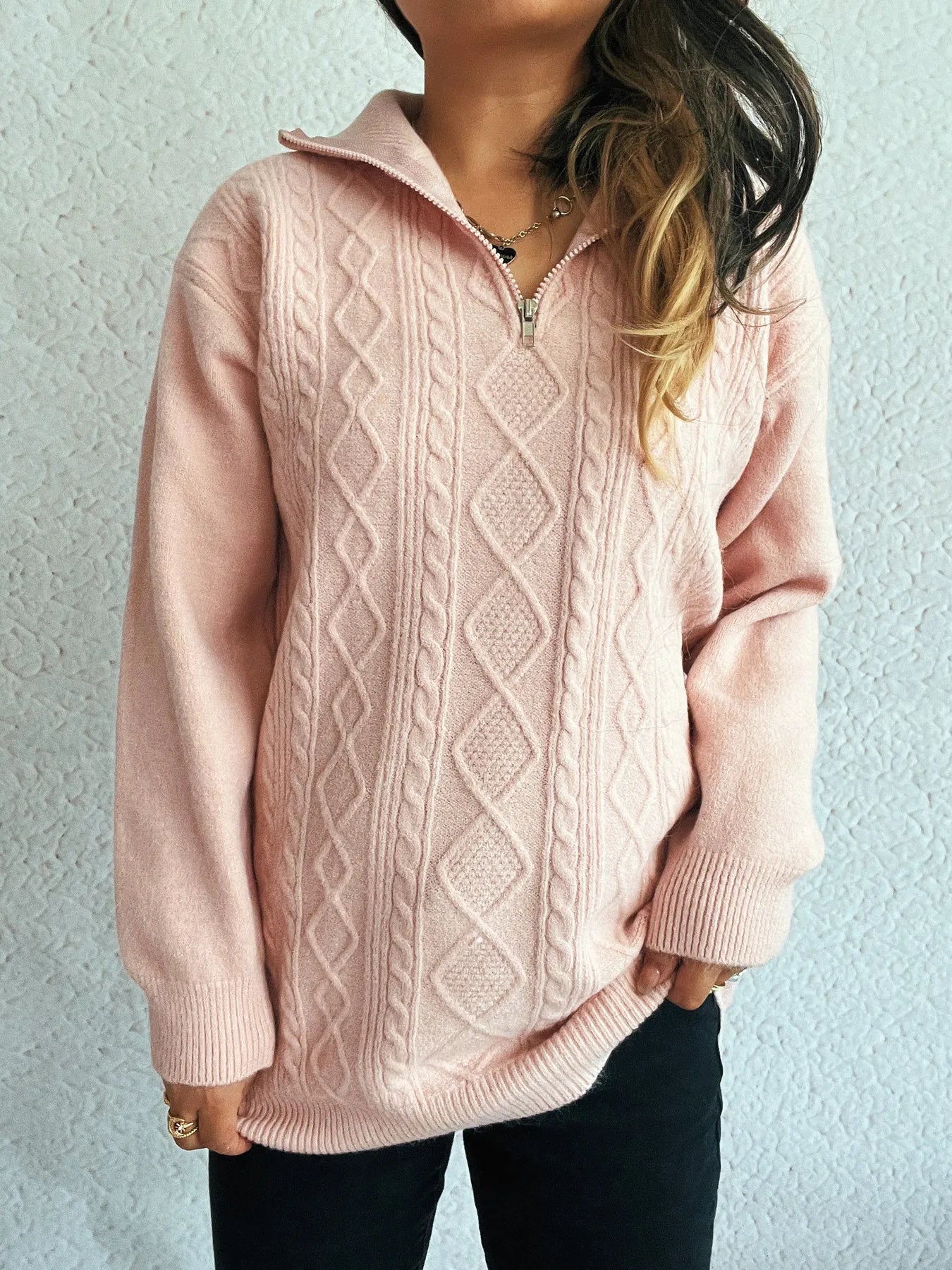 Cozy Cable-Knit Texture Zip Collar Long Sleeve Sweater in soft pink, featuring a half-zip design and relaxed fit, ideal for casual outings or cozy days at home.