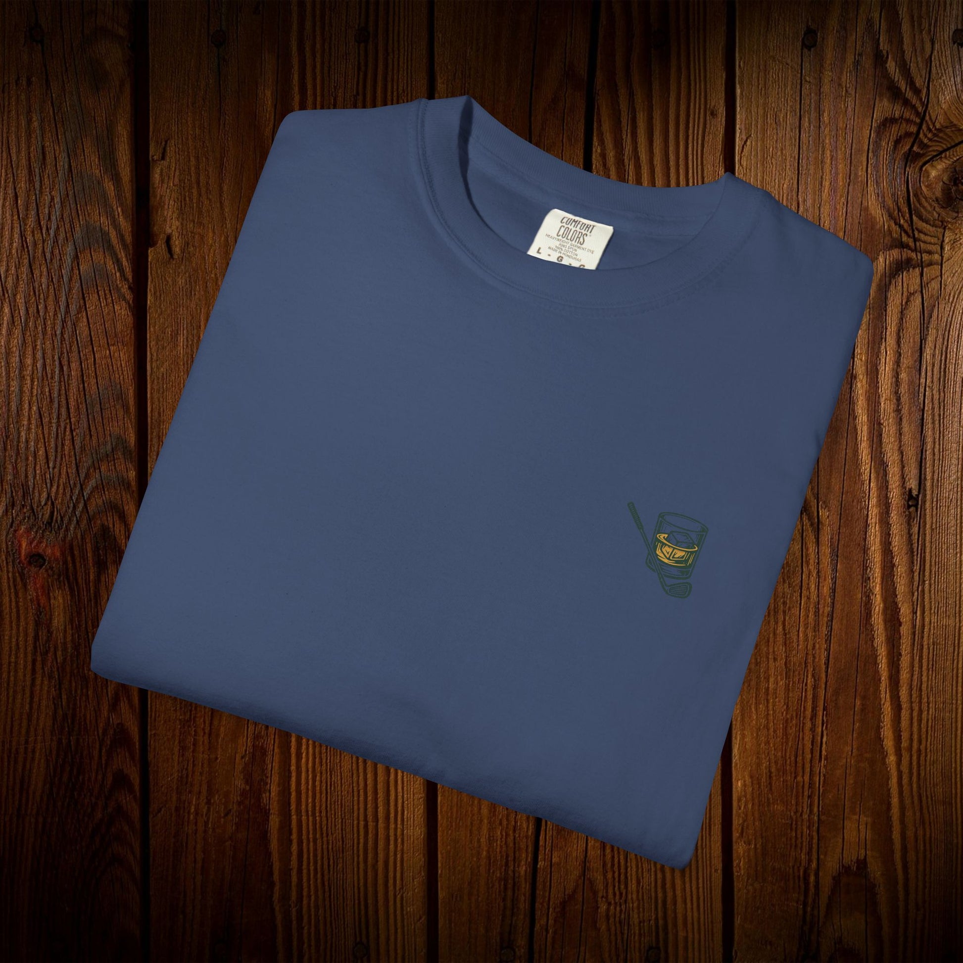 Men's Golf & Whiskey Tee presented in a rich blue color, featuring a small whiskey glass design, combining comfort with an eco-friendly style.