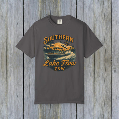 Southern Lake Flow T-Shirt in charcoal gray, featuring an eye-catching graphic of a wakeboarder on a lake, combining style and eco-friendliness for the perfect casual wear.