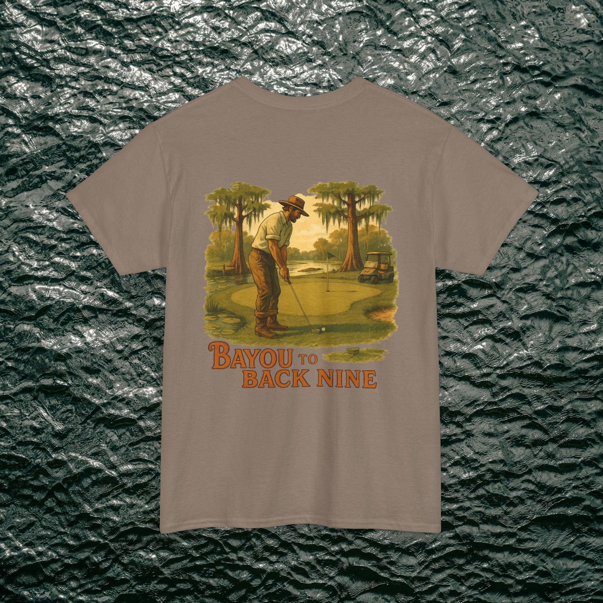 Bayou To Back Nine Softstyle Golf Tee featuring a golfer design on a light brown t-shirt, ideal for comfortable casual outings and gifting.