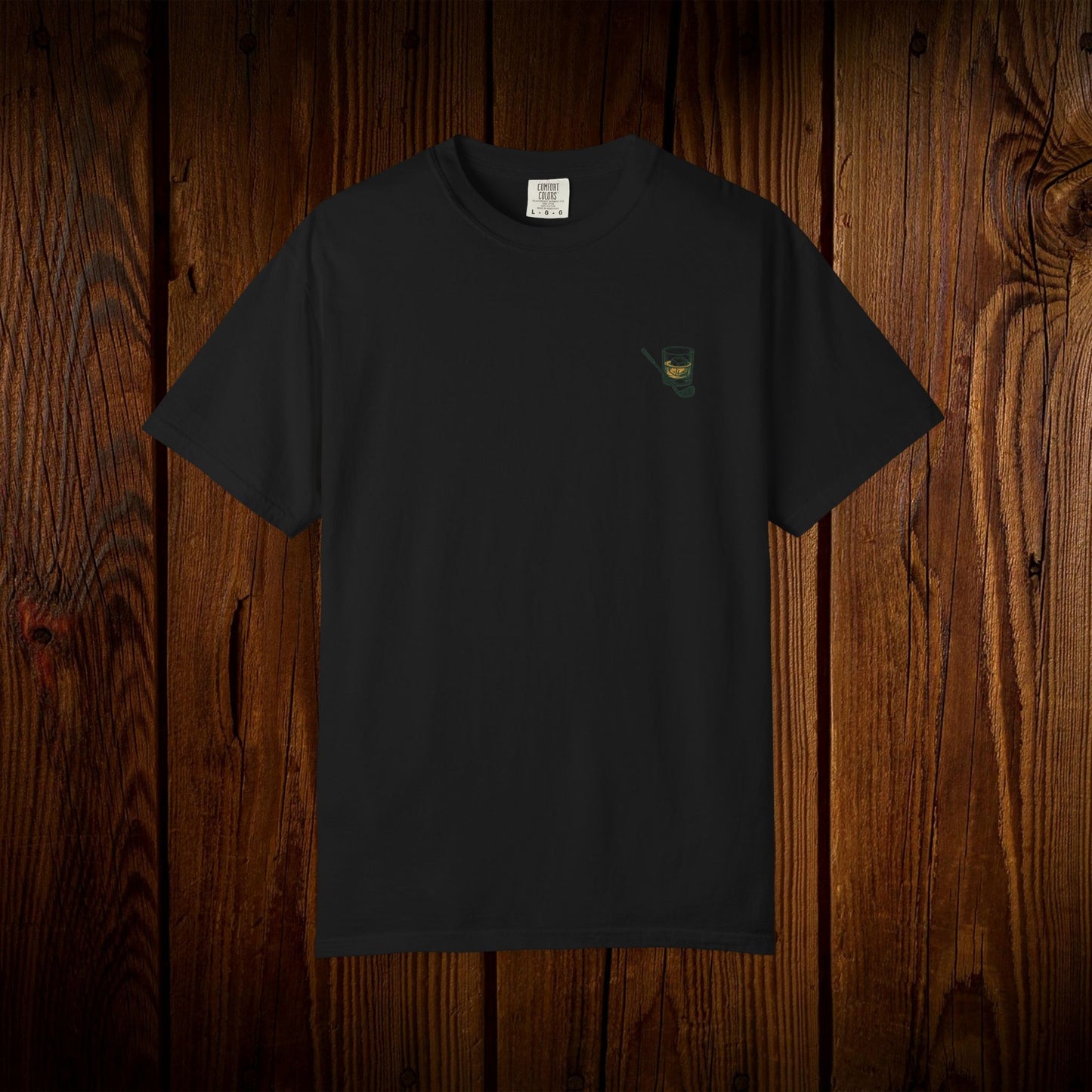 Men's Golf & Whiskey Tee in black, made from soft cotton with an eco-friendly design and unique natural color, suitable for golf enthusiasts.