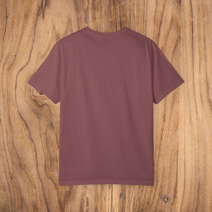 Back view of the Sunset Trees Unisex T-Shirt in a rich burgundy color, made from soft garment-dyed 100% cotton for a stylish look.