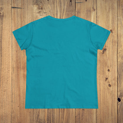 Back view of Stay Grounded Spiritual Tee in vibrant turquoise, designed for comfort at festivals and vacations, set against a wooden background.