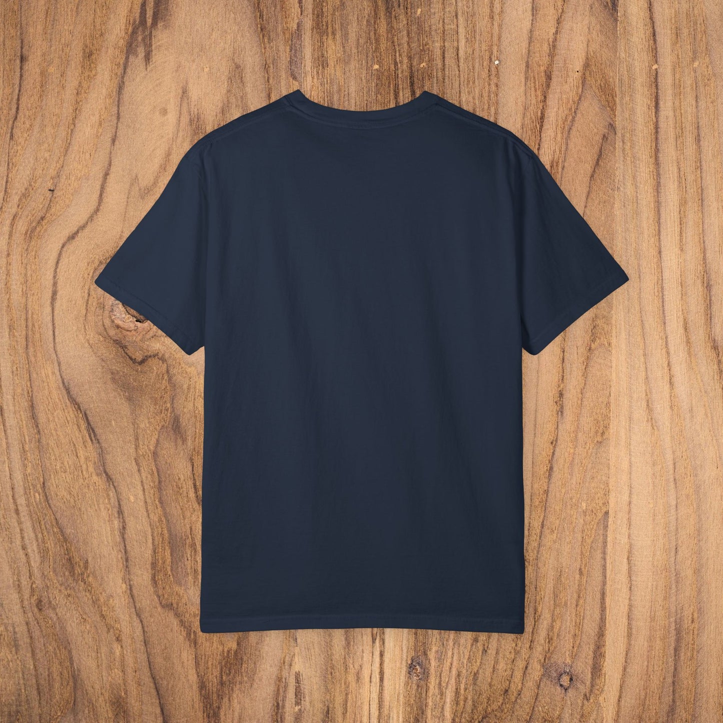 Back view of the Bayshore Lifestyle Tee in navy, emphasizing its clean lines and unadorned style, made from 100% cotton for comfort.