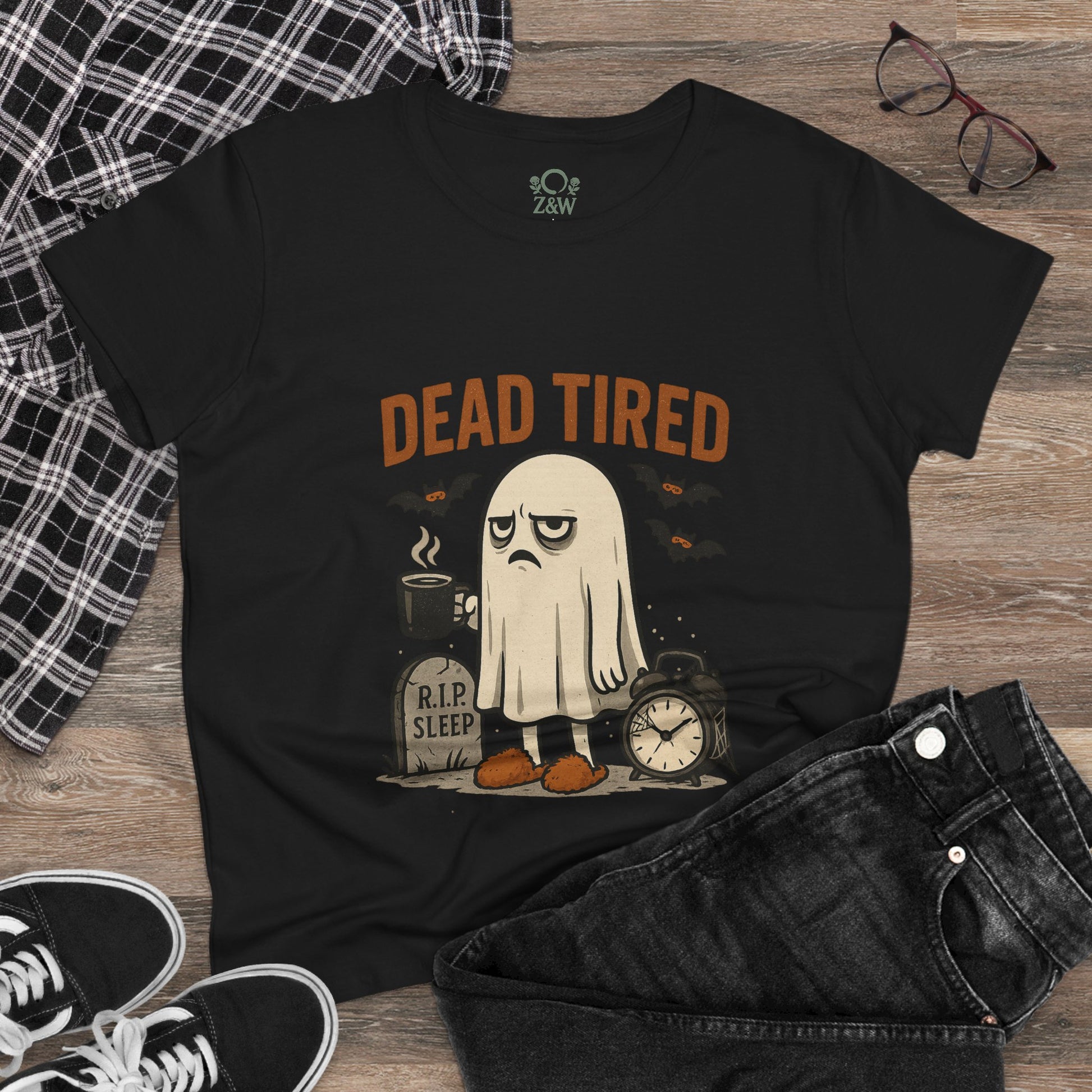 Cute Whimsical Ghost T-Shirt for Halloween displayed with stylish casual attire, showcases 'Dead Tired' graphic perfect for Halloween festivities.