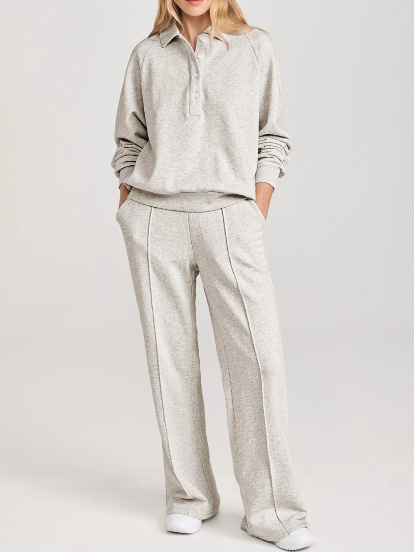 Trendsi Collared Sweatshirt & High Waist Pants Two-Piece Active Set - Soft Cotton Blend. Model showcasing the stylish sweatshirt and comfy wide-leg pants.