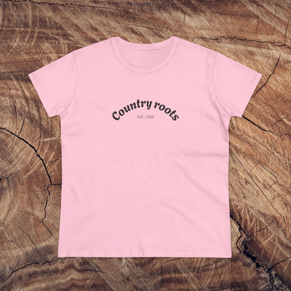 Country Roots Cowgirl Tee in cheerful pink, embodying the spirit of cowgirl fashion with the 'Country roots' logo, great for everyday wear.