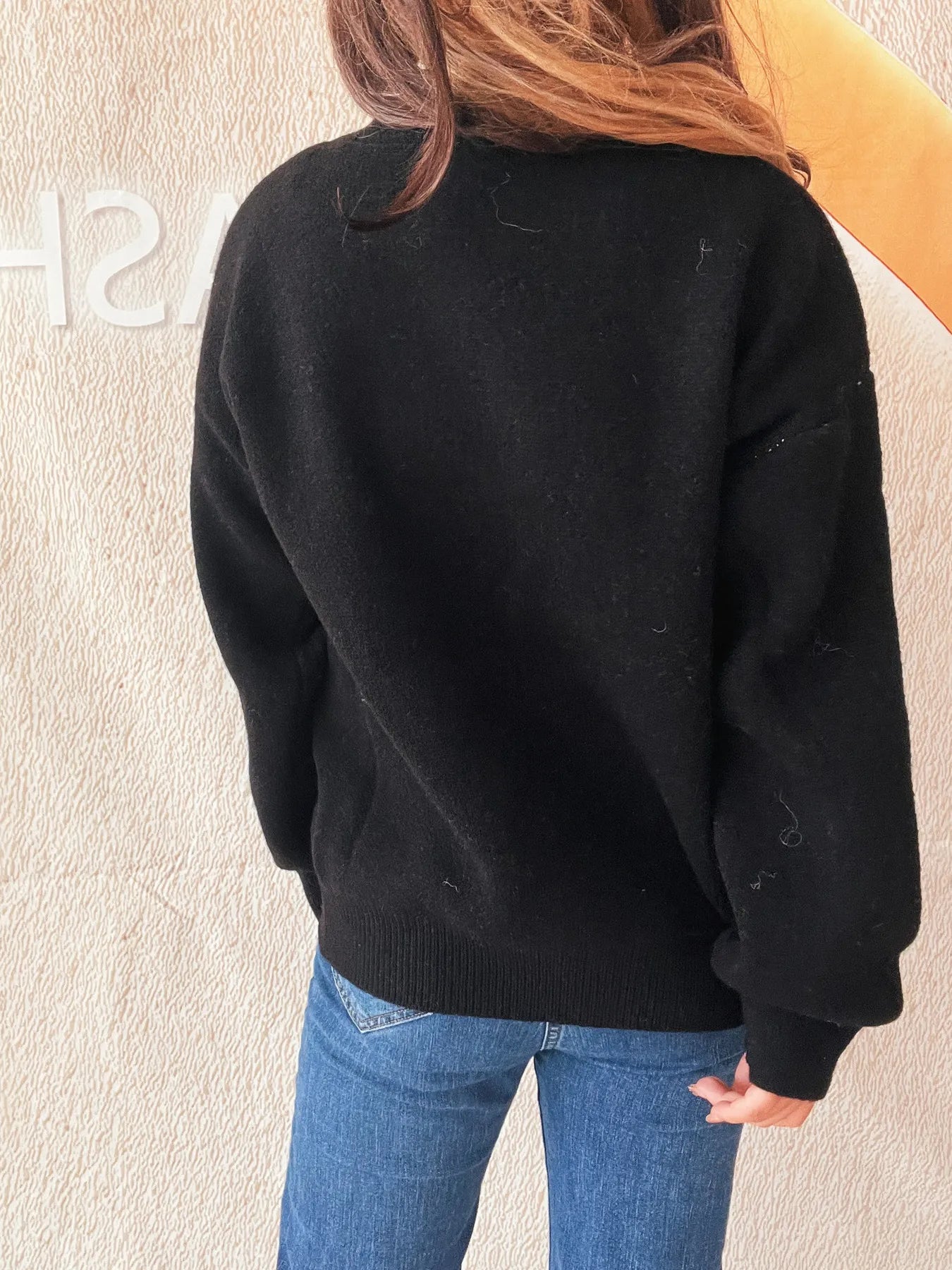 Back view of the Stylish Bow Pattern Casual Long Sleeve Sweater for Effortless Everyday Wear, showing a cozy and stylish silhouette.