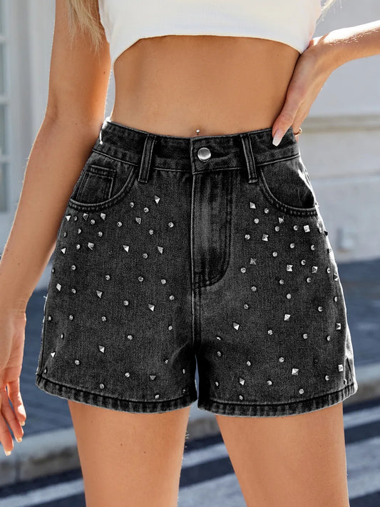 Stylish Rhinestone Washed High Waist Denim Shorts with decorative rhinestones, showcasing a flattering fit for the summer season.