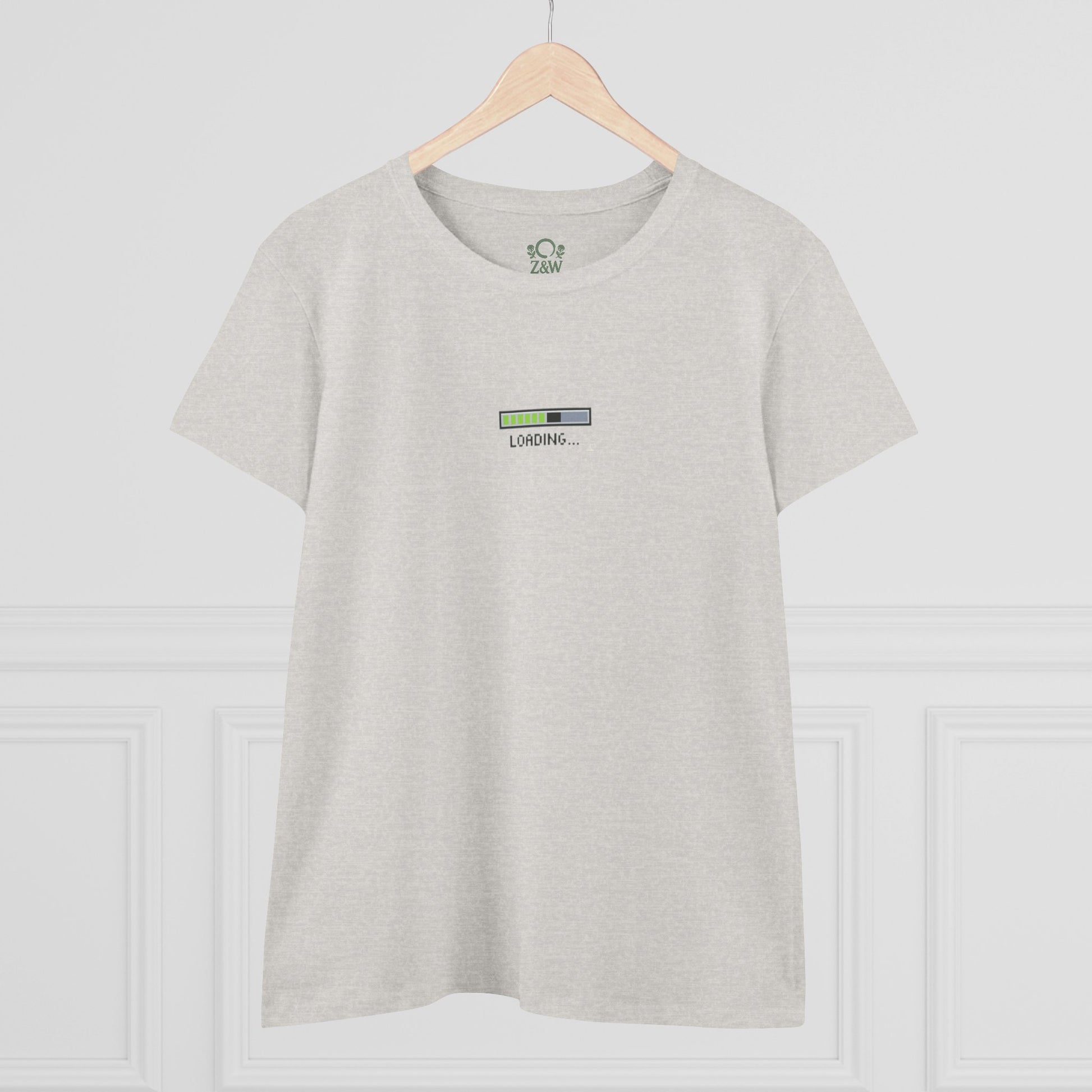 Front view of the light-colored 404 Y2K Graphic T-Shirt featuring a subtle 'Loading...' graphic. A versatile addition to both casual and trendy outfits.