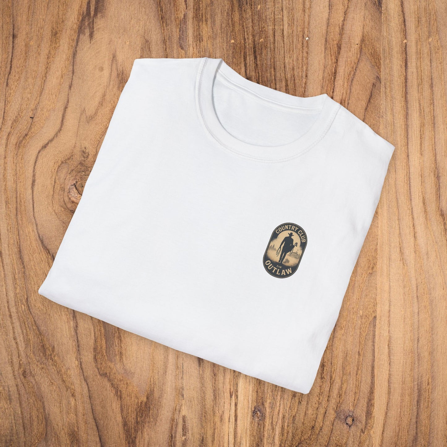 Folded white Vintage Southern Gentleman Golf Shirt with a Country Club Outlaw emblem, demonstrating its classic style and comfortable fit.