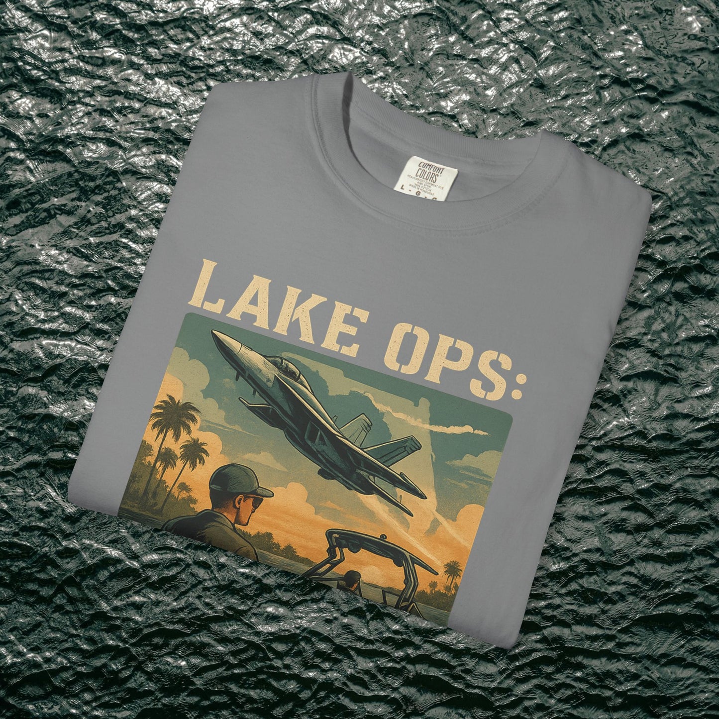 Garment-Dyed Comfort Tee For Adults in gray shade displaying a unique 'LAKE OPS:' graphic, suitable for casual outings and informal gatherings. Made from 100% ring-spun cotton, available in sizes S-4XL.
