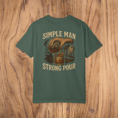 Simple Man Strong Pour T-Shirt in forest green with a striking illustration of a hand pouring a drink, designed for both comfort and style with 100% cotton.