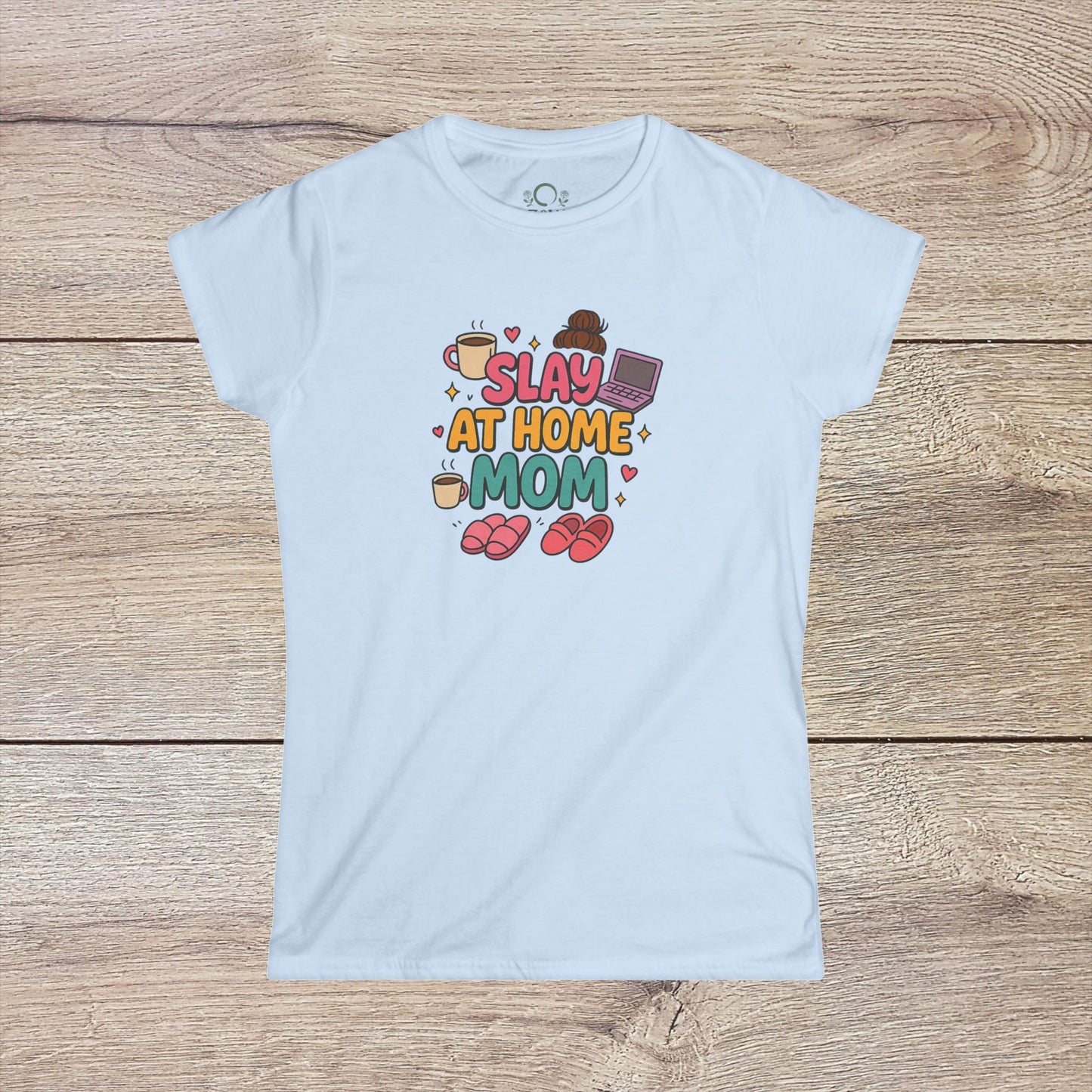 Slay At Home Mom T-Shirt in light blue featuring a cute graphic style, offering moms a comfortable and fashionable option for everyday outfits.