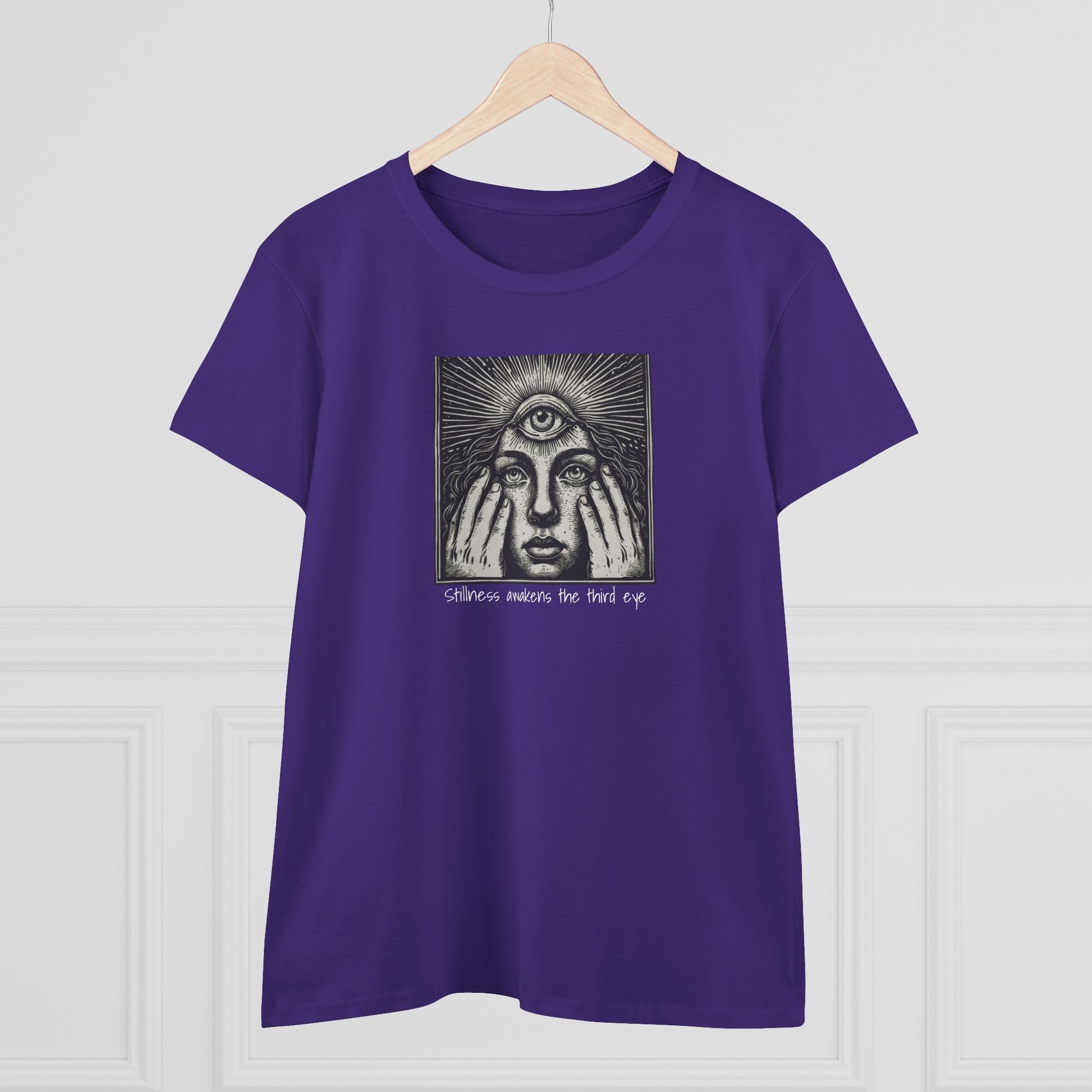 Stylish Third Eye Graphic Tee displayed on a wooden hanger in a bold purple color, featuring a prominent third eye graphic that evokes themes of insight and perspective.