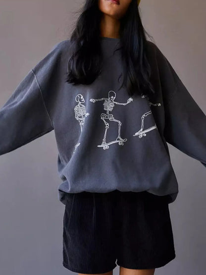 Stylish Oversized Skeleton Graphic Sweatshirt for Women with a playful skeleton skating theme, made of 100% polyester, offering slightly stretchy material.
